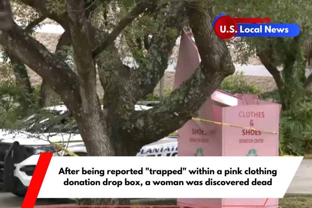 After being reported trapped within a pink clothing donation drop box, a woman was discovered dead